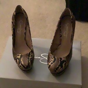 7.5M animal print NWT.  NO RIPS AND NO SCUFFS